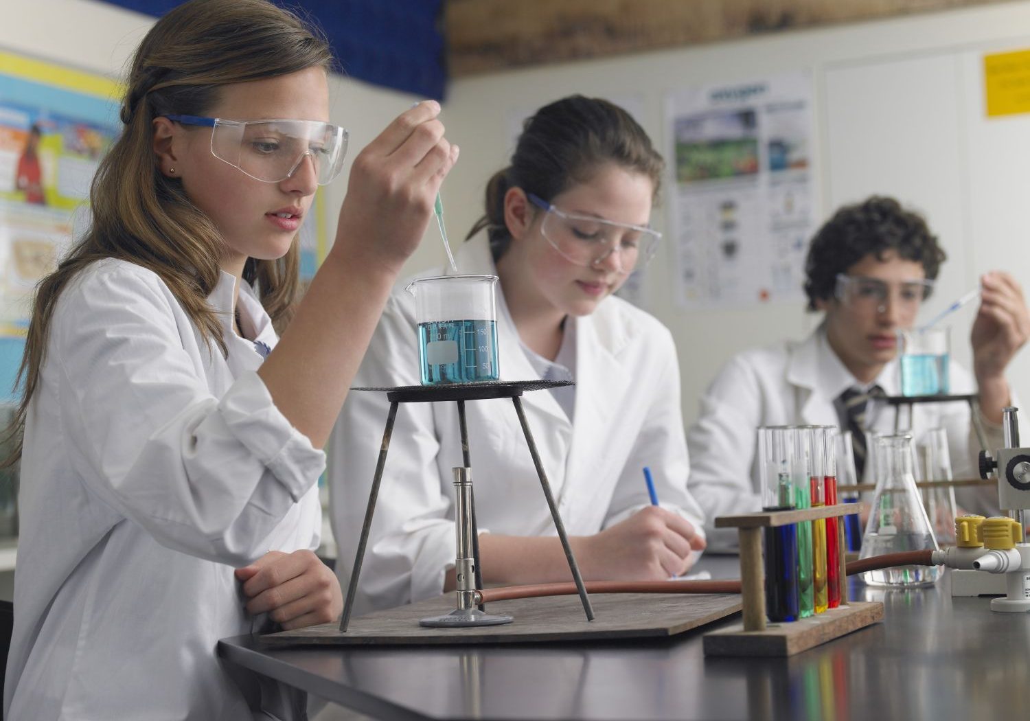 Students with test tubes and beakers